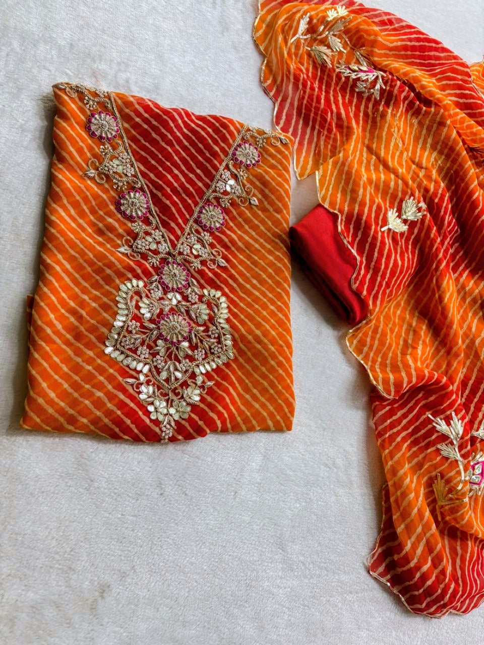 V Neck Orange Leheriya Georgette Suit with Heavy Hand Embroidery zardozi work | THE BHANKAR'S