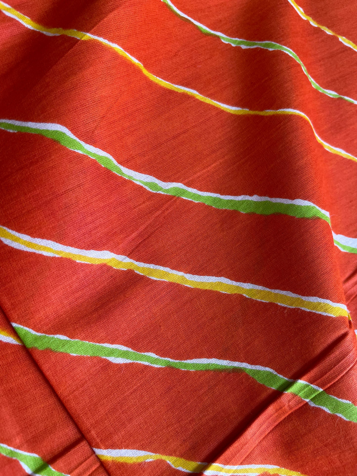 Orange Multicoloured Lahariya Print Cotton Fabric