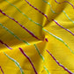 Lime Yellow Multicoloured Lahariya Print Cotton Fabric
